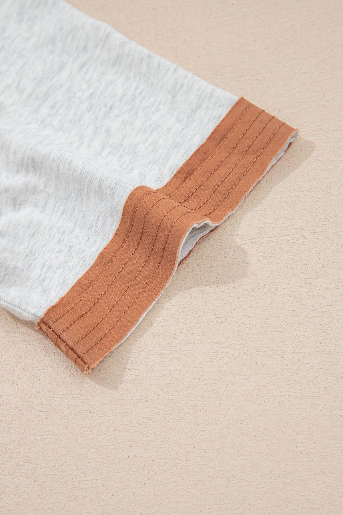 Plus Size Raw Seam Color Block Buttoned Henley Tee (S-4X)